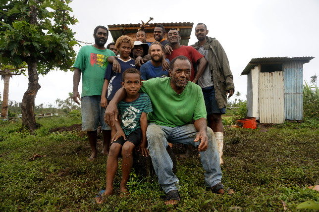 Local volunteers and the All Hands team