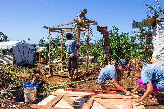 Volunteers building a toilet.
